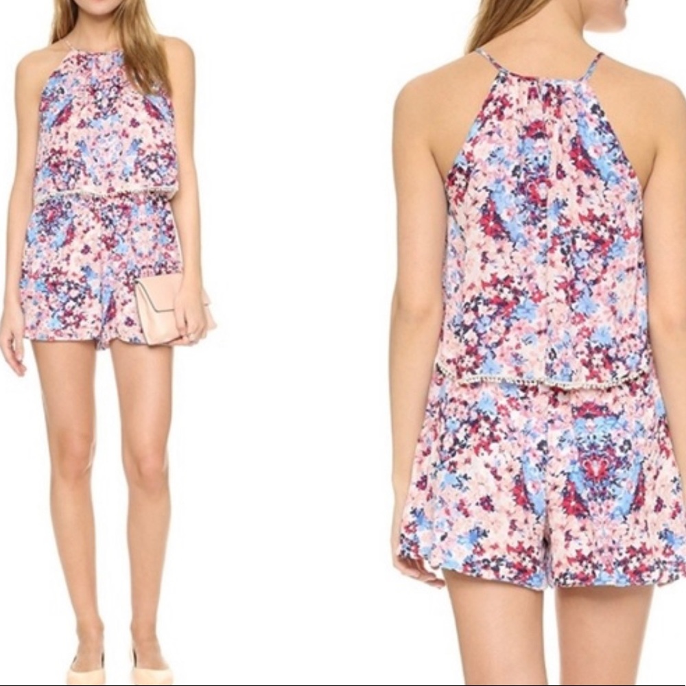 Parker catamaran pink floral romper.100% silk. L.